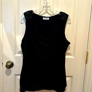 Calvin Klein women’s top wiyh sequinced trum